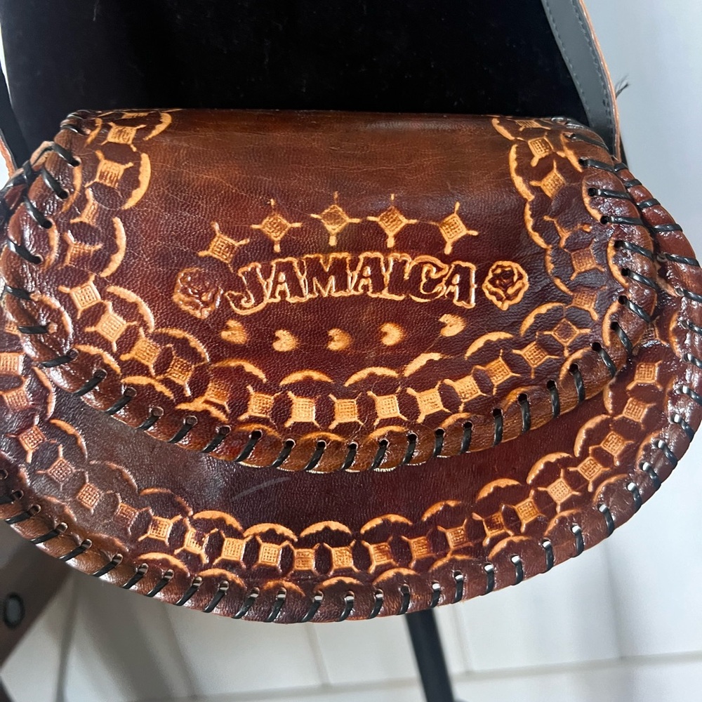 Brown Crossbody Bag with Intricate Tooled Design